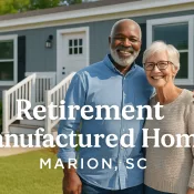 a senior couple standing in front of a modern manufactured home in Marion, SC